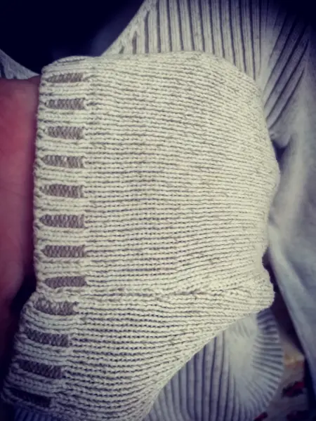 Šedé svetry XS a XL 10