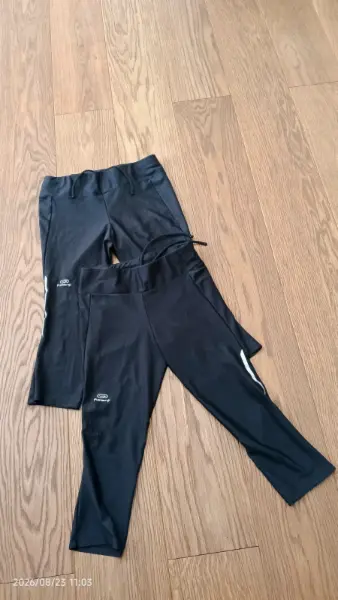 2x Černé sportovní legíny Kalenji