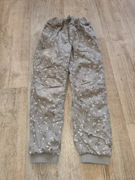H&M dívčí kalhoty s květinovým vzorem, vel. 128
