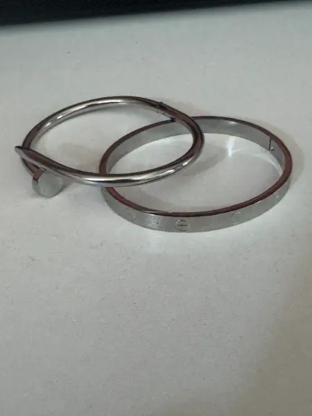 Sada dvou stříbrných náramků Cartier 7