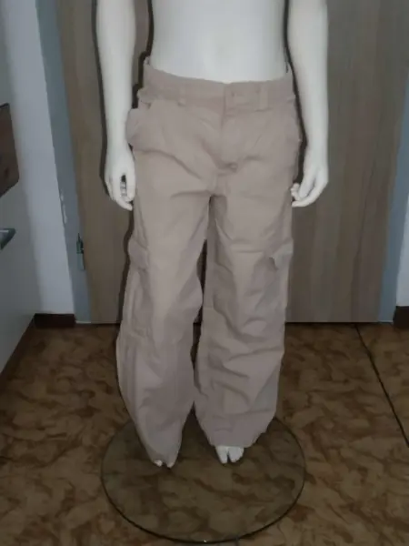 Širší bavlněné kalhoty H&M vel.140