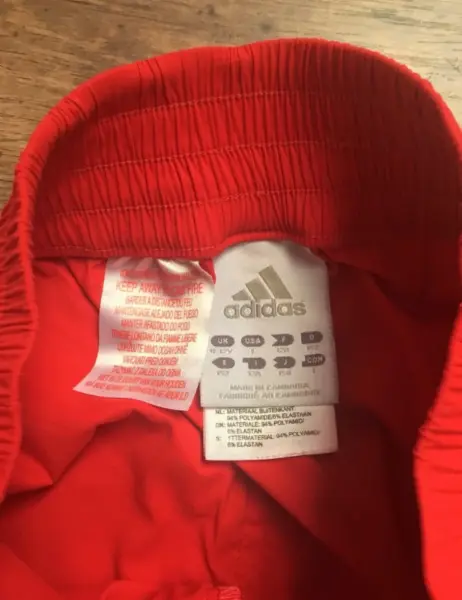 Červené dívčí  3/4 sportovní kalhoty Adidas vel 152 2