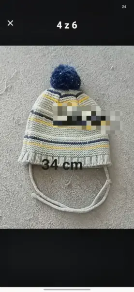 Dětská pletená čepice s bambulí a zavazováním