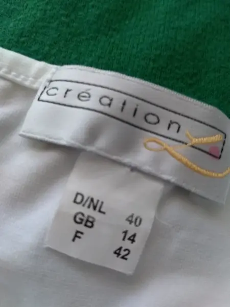 Dvě tílka L-XL 6